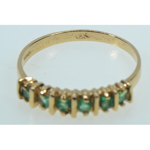 63 - 14ct gold & emerald half hoop ring, size Q, 2.56 grams