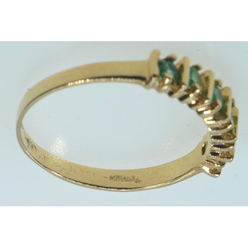 63 - 14ct gold & emerald half hoop ring, size Q, 2.56 grams