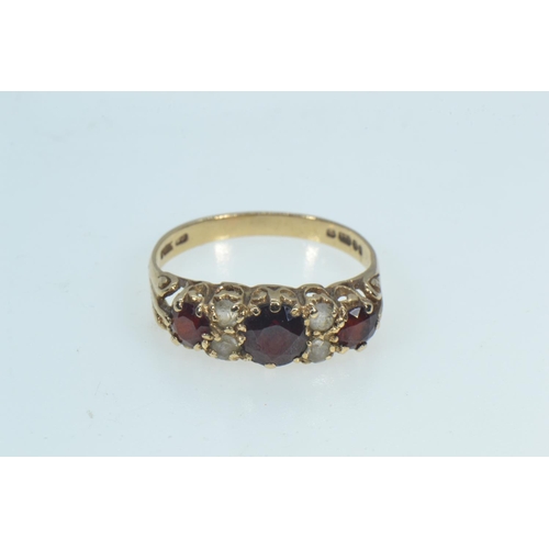 73 - 9ct gold, garnet & white stone ring, size O, 2.11 grams