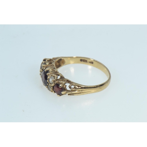 73 - 9ct gold, garnet & white stone ring, size O, 2.11 grams