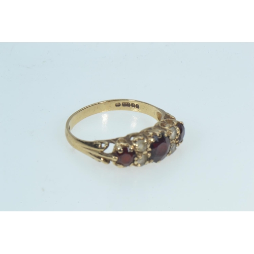 73 - 9ct gold, garnet & white stone ring, size O, 2.11 grams