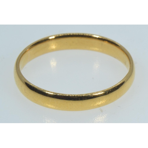 79 - 22ct gold band ring, size N1/2, 2.75 grams