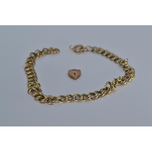 89 - 9ct gold scrap bracelet & heart-shaped clasp, gross weight 5.93 grams