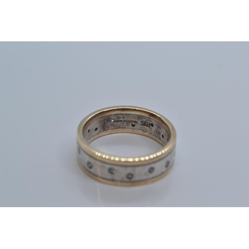 92 - 9ct gold & 925 silver band with small flush set diamonds. 5g gross weight. Size M/N