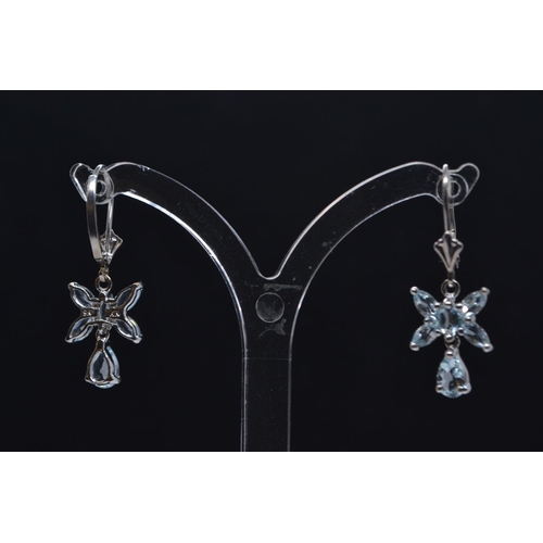 107 - Pair of 9ct white gold & aquamarine pendant earrings, with hinged hook fittings, length 30mm, gr... 