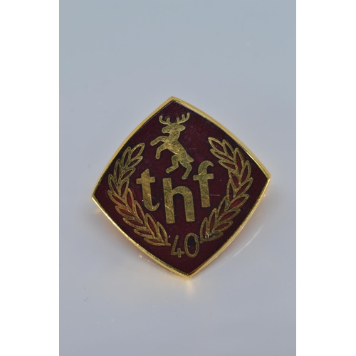 110 - 9ct gold & enamel 'THF' 40 year long service badge, 4.19 grams, together with a HM silver & ... 