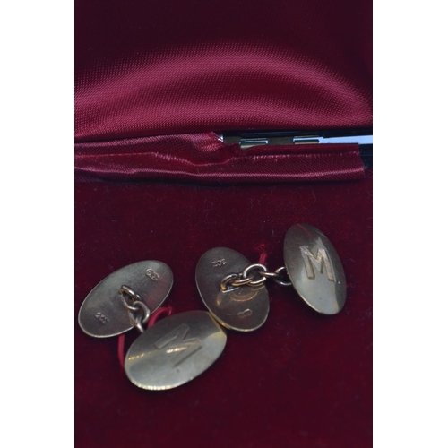 112 - Pair of 9ct gold cufflinks, each link engraved with the initial 'M', gross weight 6.95 grams