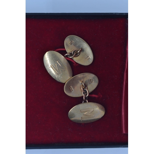 112 - Pair of 9ct gold cufflinks, each link engraved with the initial 'M', gross weight 6.95 grams