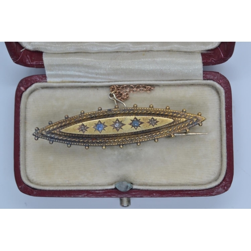 115 - 9ct gold, diamond & sapphire brooch, width 50mm, 3.85 grams, with a fitted box