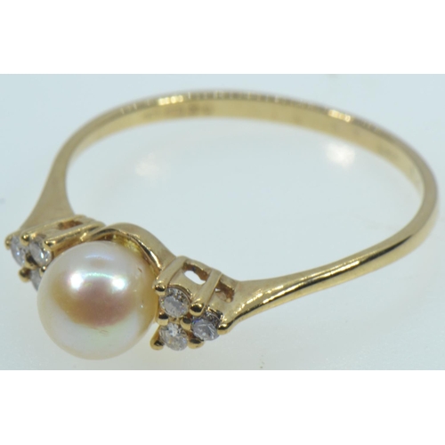 121 - 9ct gold, cultured pearl & diamond ring, size R, 1.73 grams