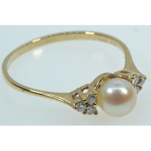 121 - 9ct gold, cultured pearl & diamond ring, size R, 1.73 grams