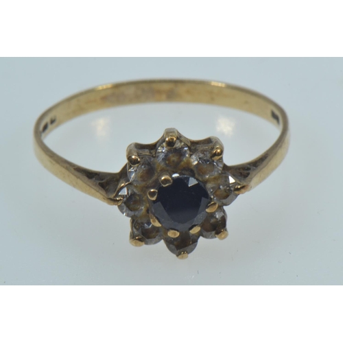 125 - 9ct gold, sapphire & white stone flowerhead cluster ring, size P1/2, 1.68 grams