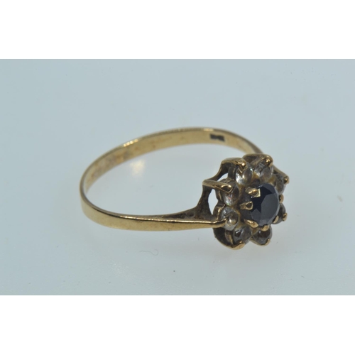 125 - 9ct gold, sapphire & white stone flowerhead cluster ring, size P1/2, 1.68 grams