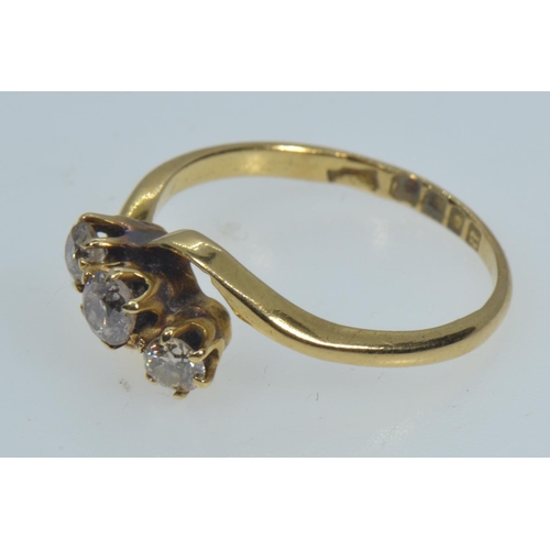 135 - 18ct gold & three stone diamond ring, size M, 2.49 grams