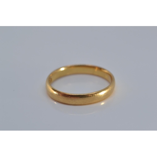 138 - 22ct gold band ring, size K, 2.5 grams