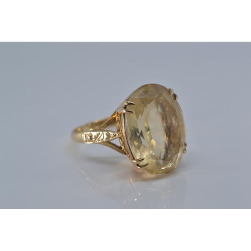 166 - 9ct gold ring claw set with pale citrine coloured stone, size O/P, gross weight 5.5 grams