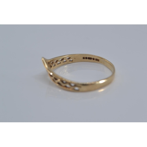 168 - 9ct gold open work wishbone ring, size P, 1.2 grams