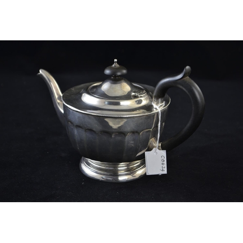 187 - Silver three piece tea service, maker Viner's Ltd, Sheffield 1931, comprising teapot with ebonised h... 