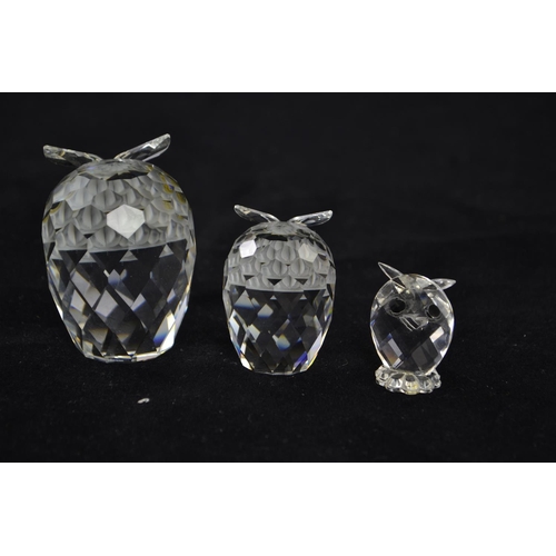 245 - Three Swarovski owl figures, A7636NR060000, A7636NR046000 & A7654NR038000 respectively, with box... 