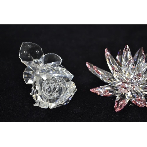 270 - Four Swarovski flowers, including: Lotus Flower, no. 5100663, A9100NR000001; Desert Rose gist, no. 5... 