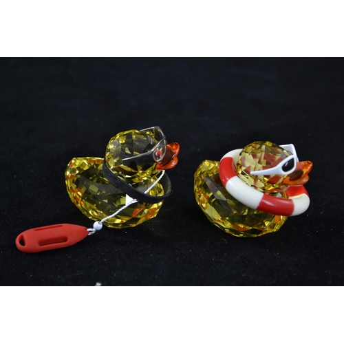 279 - Two Swarovski Happy Duck figures, Sunny Sam with sunglasses and rubber ring & Lifeguard with sun... 