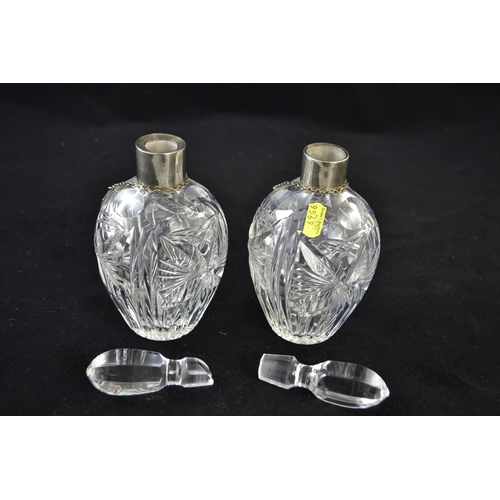 204 - Matched pair of silver collared decanters, with silver decanter labels for brandy & gin, decante... 