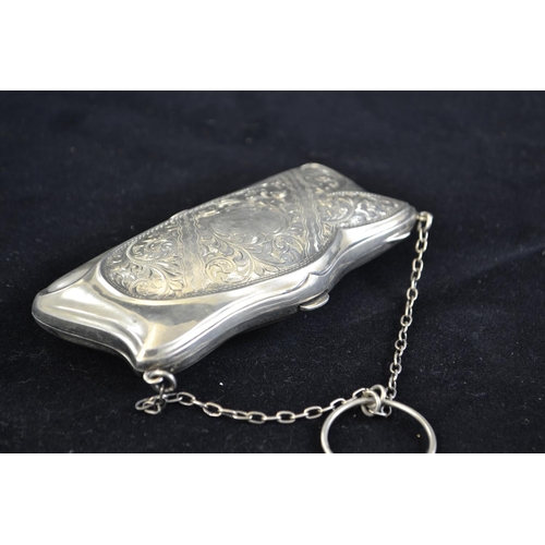 197 - Silver ladies purse, maker's mark indistinct, Chester 1919, with foliate scroll decoration & fin... 