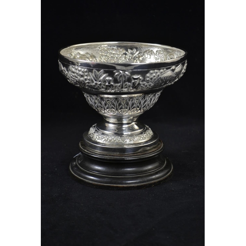 175 - Indian white metal footed bowl, circa 1900, embossed with village scenes, maker's mark to base 'Gris... 