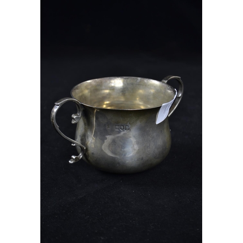 177 - Twin-handled silver porringer, maker Wakely & Wheeler, London 1903, height 7.7cm, & a silver... 