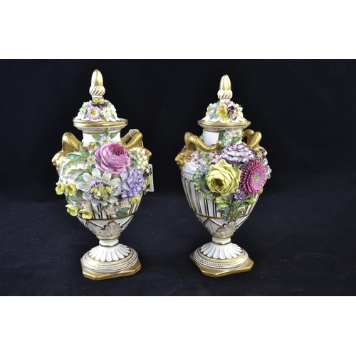 350 - Pair of John Bevington porcelain floral encrusted vases and covers, late 19th century, with gilt ram... 