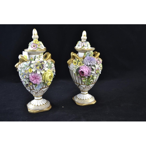 350 - Pair of John Bevington porcelain floral encrusted vases and covers, late 19th century, with gilt ram... 