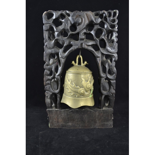 372 - Oriental brass temple bell with heavily carved hardwood frame and ornate inlaid wirework, overall he... 