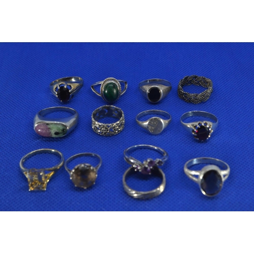 223 - Twelve silver rings, some stone set, two unmarked, gross weight 45.3 grams