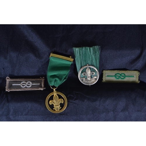 421 - 1963 Scouting Medal of Merit awarded to E.M Whitaker with cloth merit badges and EPNS Scoutmaster ha... 