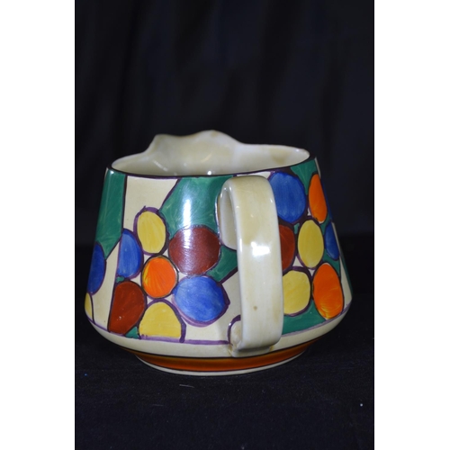 434 - Clarice Cliff Fantasque 'Pebbles' pattern jug, hand painted with repeat panels of multicoloured disc... 