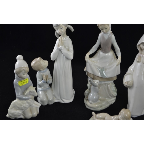 391 - Six Lladro figures inc. two children in nightgowns, shepherd girl, girl with lamb, girl with rabbit ... 