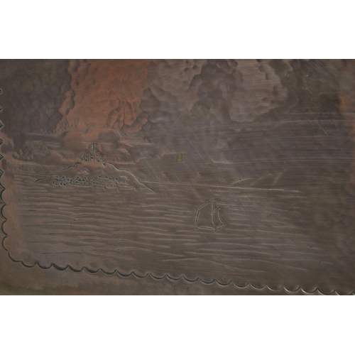 392 - A Newlyn copper rectangular tray with planished and chased detail depicting St Michael's Mount and a... 