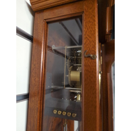 444 - Wood cased wallclock by Comitti, London; with glazed front & sides, pendulum & key present