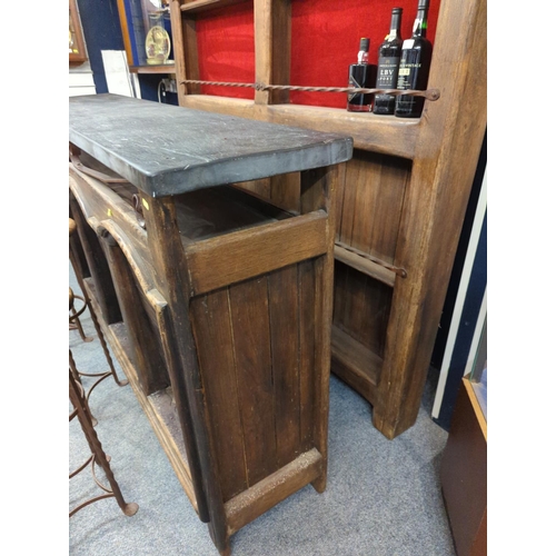 446 - Slate topped rustic bar with slate top, shelf wall unit behind, & 3 bar stools,