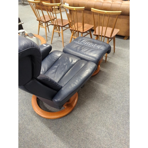 472 - Navy blue leather 'Stressless' recliner with footstool