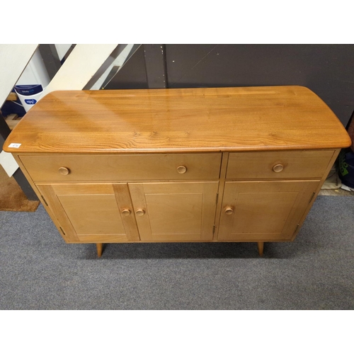 476 - Ercol Model 351 sideboard in beech and elm in a natural finish; 123 x 45.5 x ht82cms