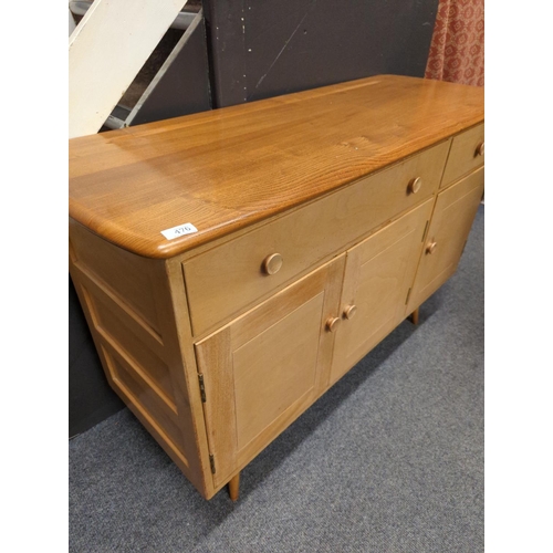 476 - Ercol Model 351 sideboard in beech and elm in a natural finish; 123 x 45.5 x ht82cms