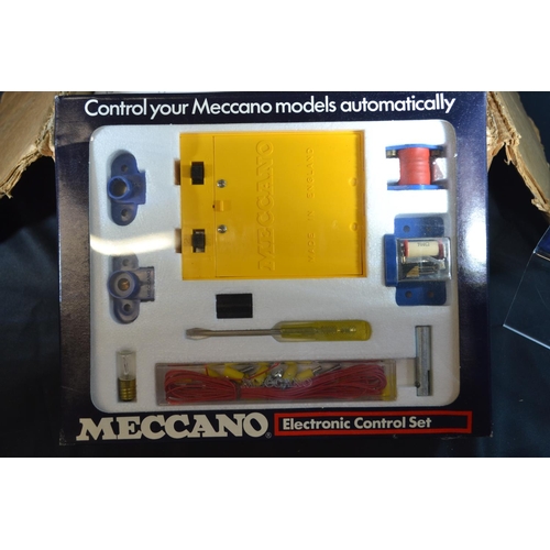 309 - Meccano electric control set and various wheels and 8 large tooth quadrants.