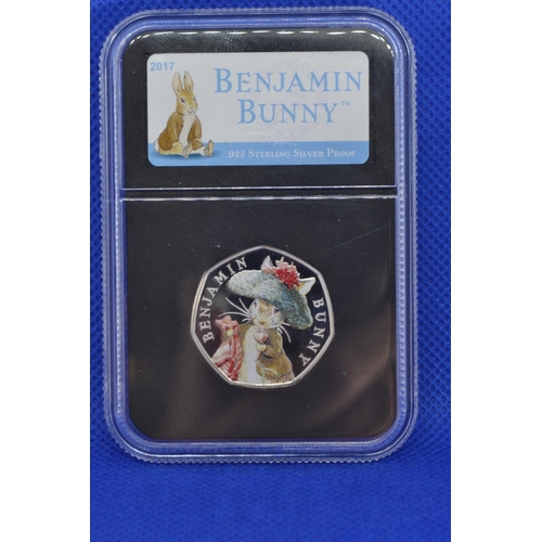 317 - Danbury Mint Benjamin Bunny 925 sterling silver proof 50 pence in perspex case, together with variou... 