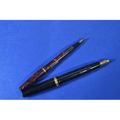 320 - Two fountain pens, including Conway Stewart Dinkie 560 & Parker with 14ct gold nib