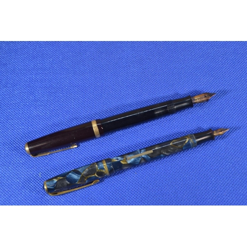 322 - Two fountain pens with 14ct gold nibs, including Parker Duofold & Burnham