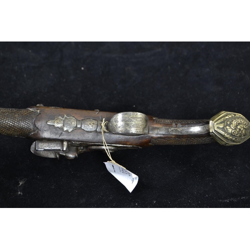 331 - 16-Bore flintlock duelling type pistol, possibly European, circa 1800, with carved woodwork and fine... 