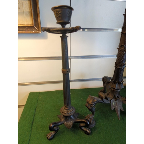 370 - Three decorative bronzed candlesticks, largest with crane standing on tortoise detail finial (detach... 