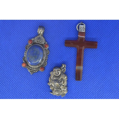 235 - Six pendants, 925 silver or white metal mounted, including three amber set, an agate cross, lapis la... 