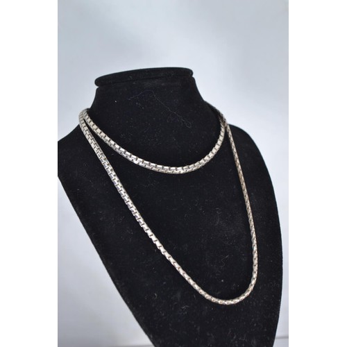 238 - Two silver neck chains, measuring 84cm and 50cm respectively, gross weight 38.8 grams